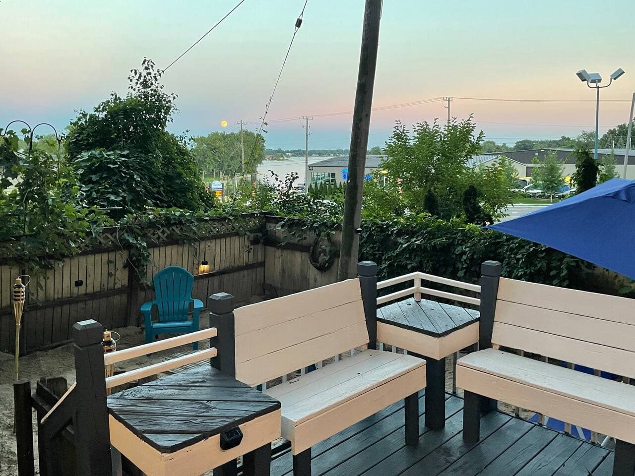 Deck seating with a Cass Lake view at sunset