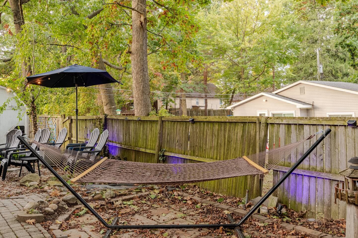 Backyard hammock lounge under string lights