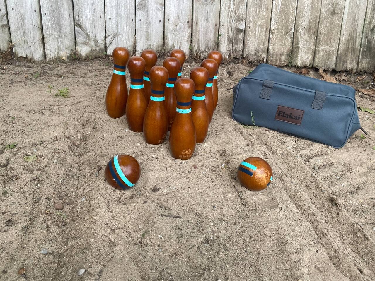 Giant wooden lawn bowling set